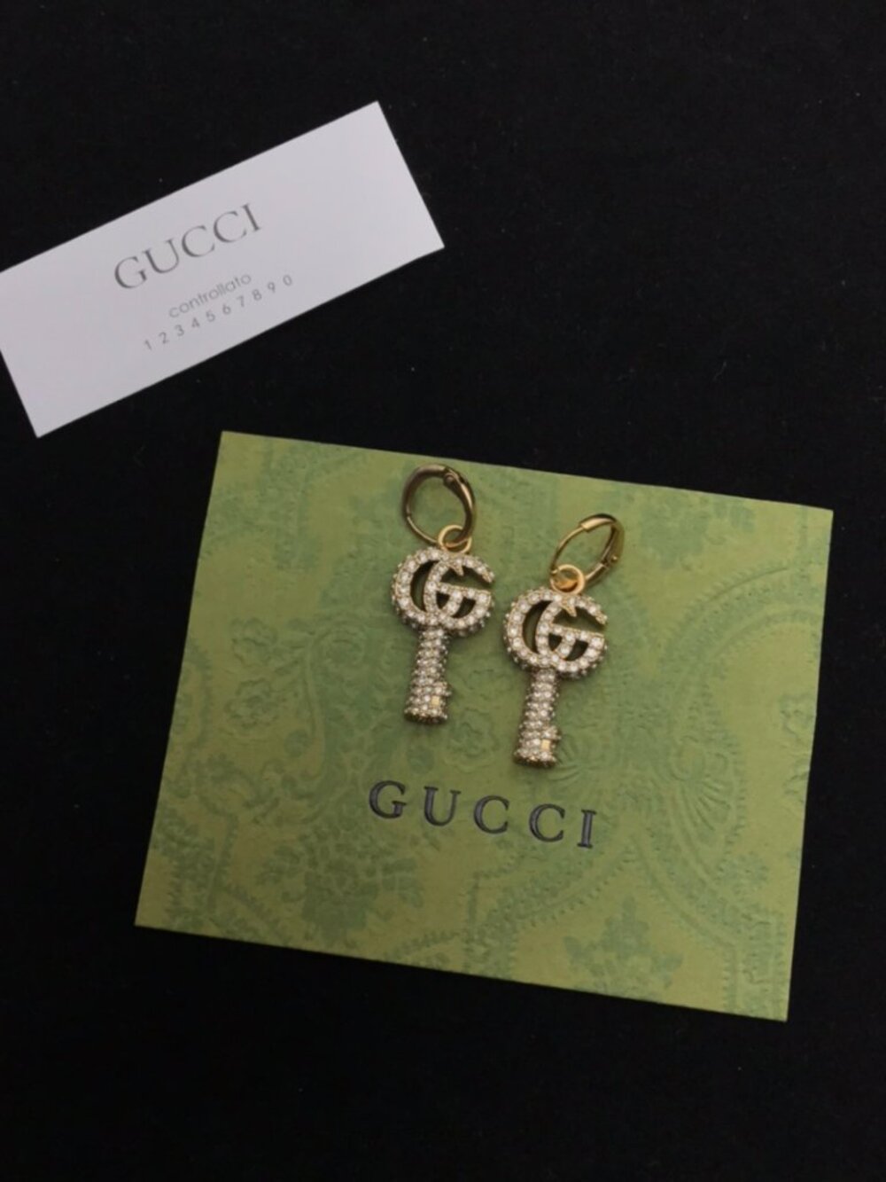 Gucci Gold and Silver Dangle Earrings with Iconic GG Design